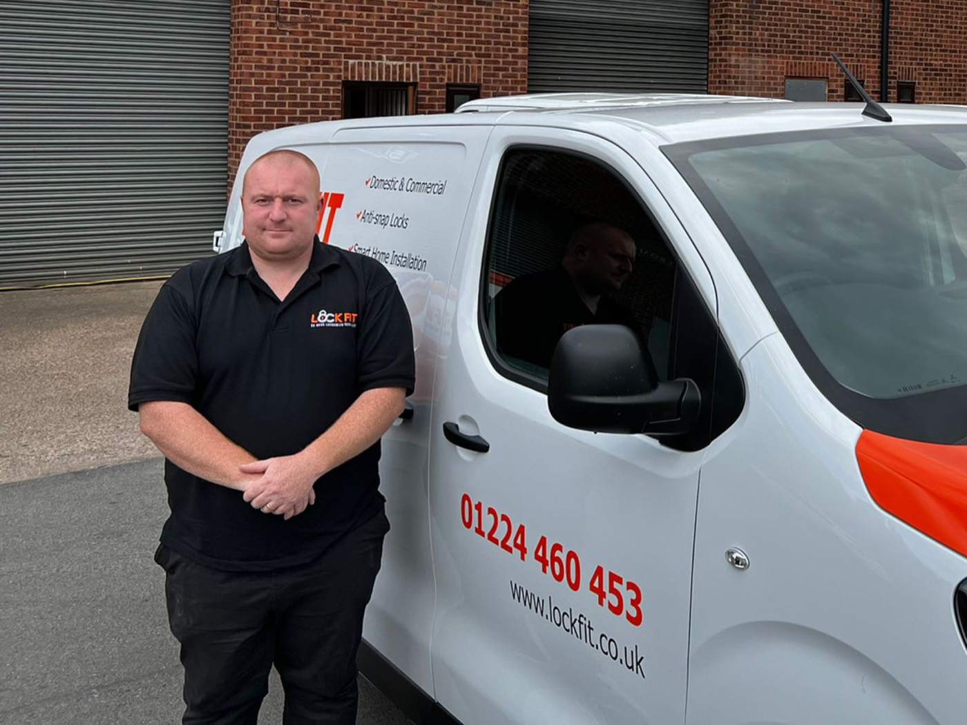 Craig, LockFit Aberdeen locksmith, beside his van