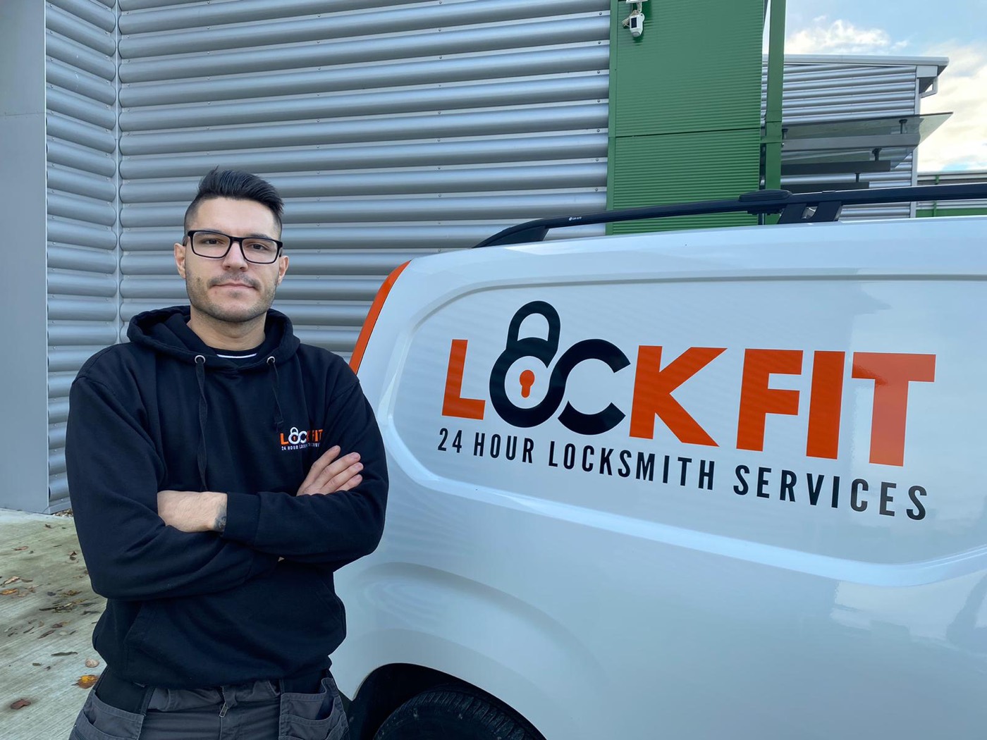Mario, LockFit Luton locksmith, beside his van